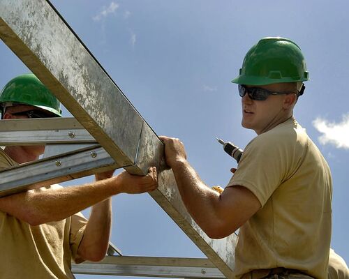 construction-worker-building-installing
