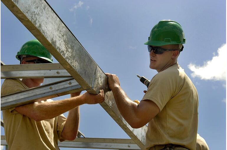 construction-worker-building-installing